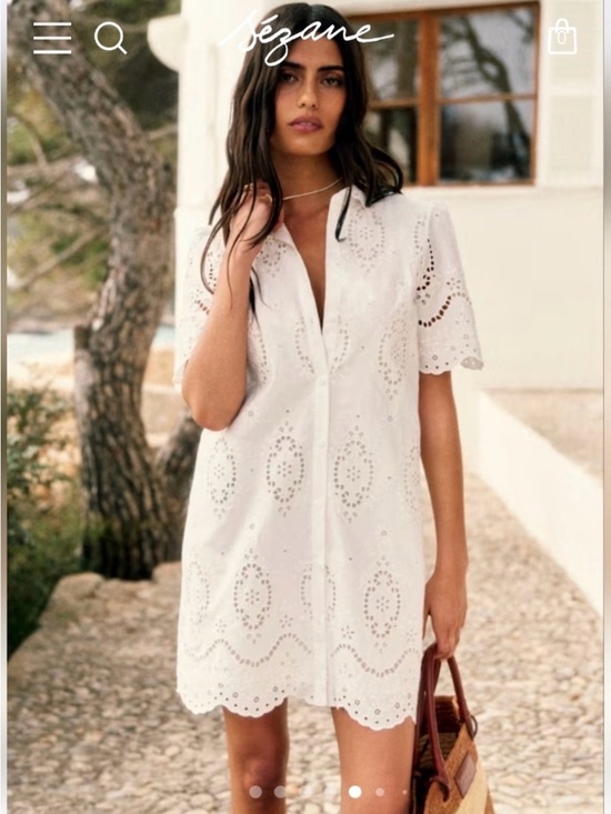 Sezane Dresses & Skirts - Sezane White Eyelet Mini Dress - worn once!